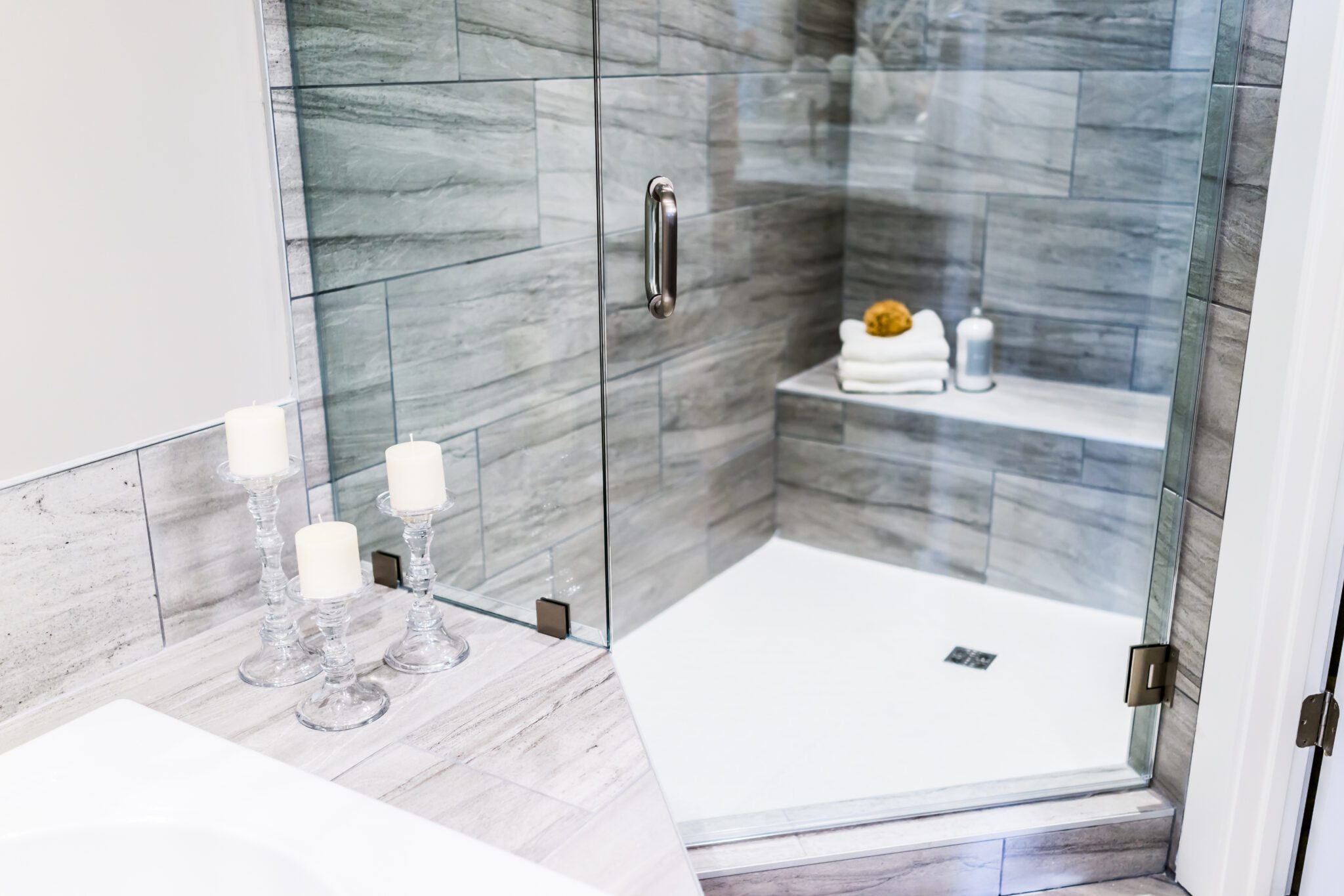 Closeup of corner glass shower