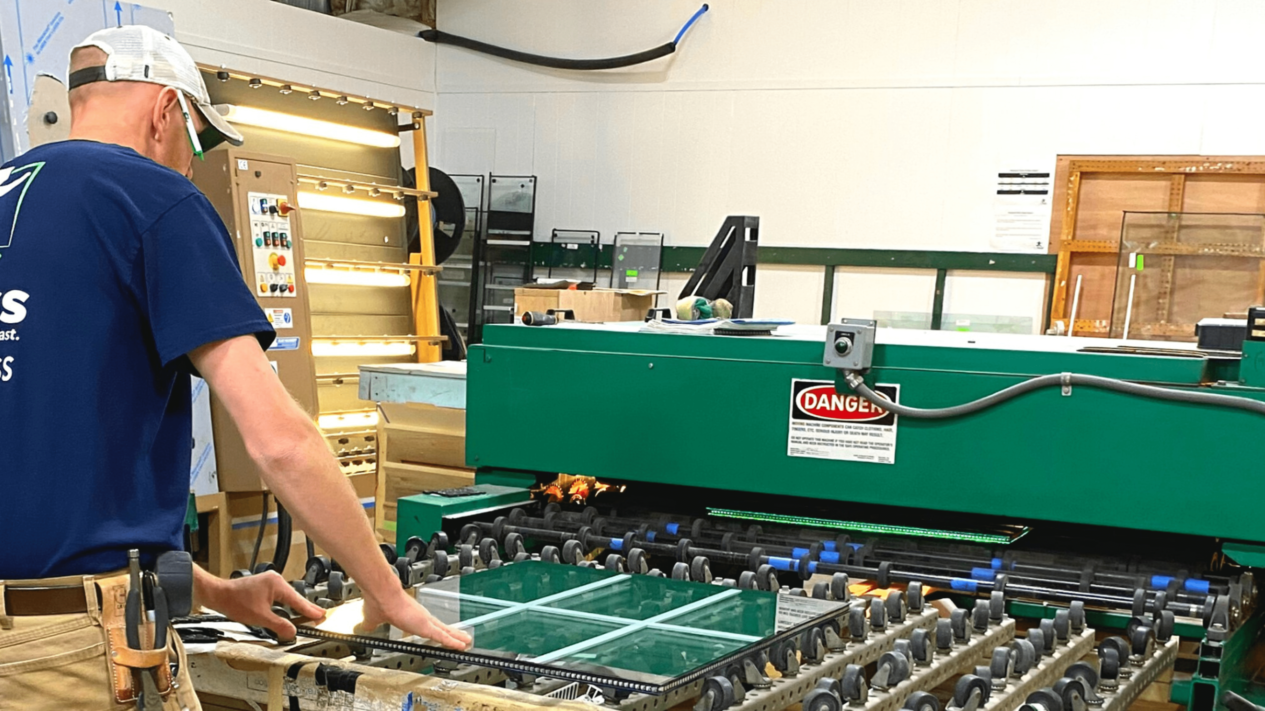 GoGlass worker assembling glass unit at shop